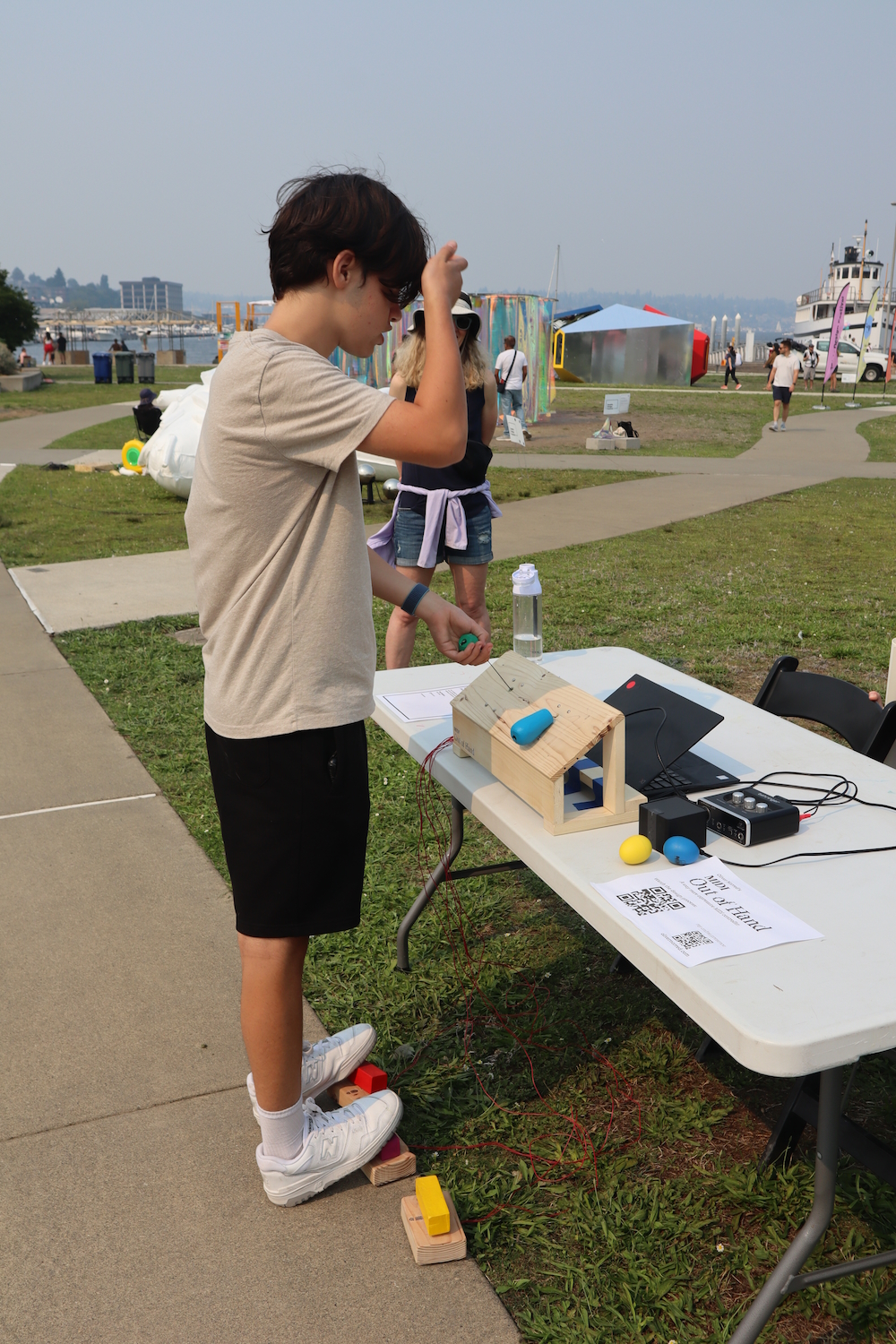A Seattle Design Festival guest experiments with the controller